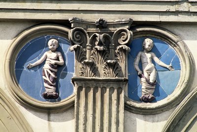 Roundel and pilaster from a spandrel of the loggia by Andrea Della Robbia